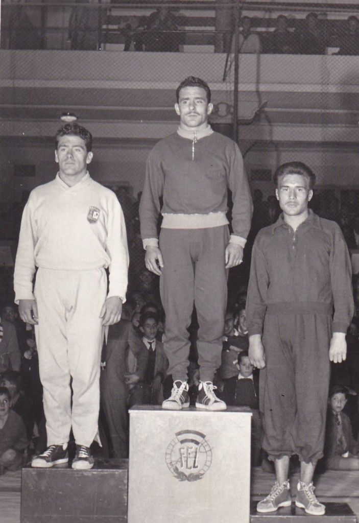 Joan Sempere participant amb la Selecció Espanyola de Lluita i pujant al podi com a Campió a l'any 1958, cosa que va ser molt habitual durant tota la seva carrera esportiva dins de la Lluita Greco-romana.